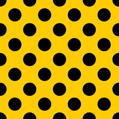 Tile vector pattern with black polka dots on yellow background