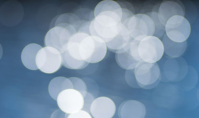 Blurred Lights on blue water bokeh background