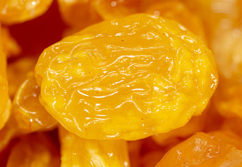 Yellow raisins as background