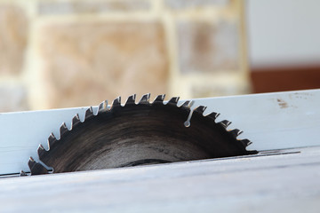 Circular saw use for cutting wooden in carpenter's shop.