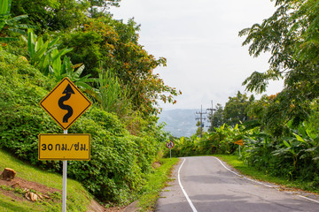  Winding path sign, it's way down hills