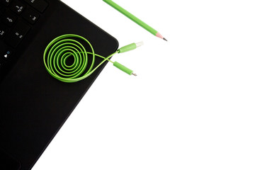 green usb cable on the copmputer isilated white background