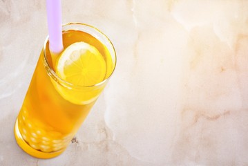 Summer drinks with ice, fresh berries, lemon and lime isolated on white