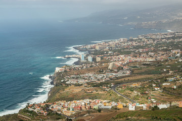 This panoramic photograph, taken at a Mirador de El Lance, shows the north coast of Tenerife and the Orotava Valley. Tenerife, Canary Islands