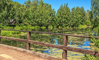  lake and  wooden bridge