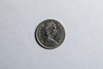 canadian coin on white background
