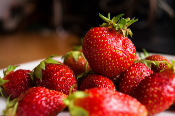 Vintage garden strawberries on a plate.