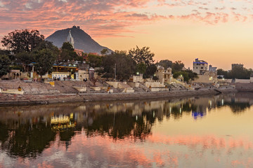 Ghats at Pushkar lake at sunset in Rajasthan. India