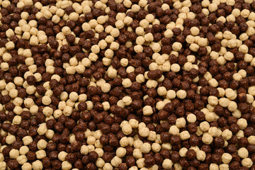 Chocolate corn flakes  as a background.