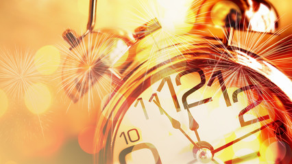 Double exposure of alarm clock , fireworks and shiny gold bokeh background for countdown new year, time, celebration, holiday concept