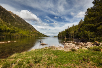 The beautiful Aigüestortes i Estany de Sant Maurici National Park of the Spanish Pyrenees in...