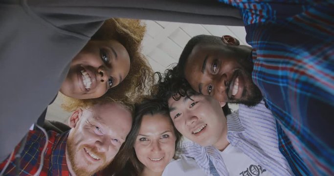 Multicultural group of people in a circle