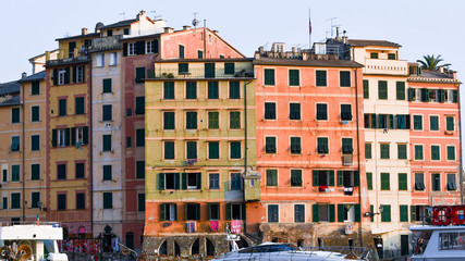 Fototapeta na wymiar Group of colored houses of the port of Camogli in Italy