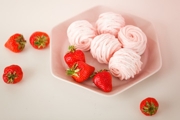 strawberry marshmallow with strawberries on a plate