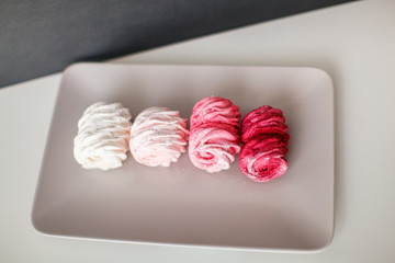 Fruit marshmallow on a gray plate