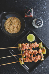 Japanese style skewers chicken meat grilled.