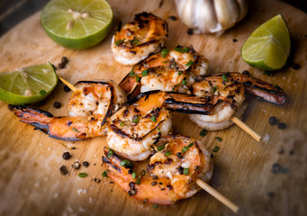 Skewer shrimps burnt grilled with spice seasoning.