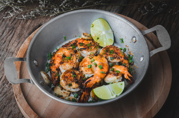 Cooked shrimp prawns with spicy seasoning.