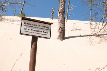 Leba, Poland, June 2019. Strict Protection Area sighn in Slowinski National Park, Leba, Poland Baltic Sea (Lacka dune)