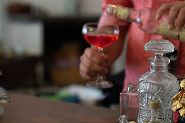 Drinking whiskey or other alcoholic beverage after dinner. Selective focus