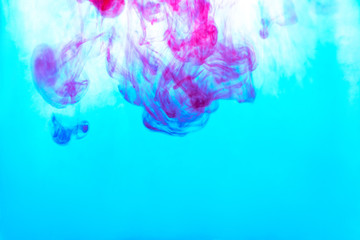 blue pink ink diluted in light blue in water