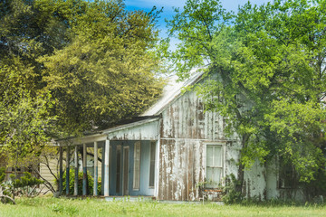 Rustic old farm house with blue skies