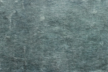 Brushed green metal texture.