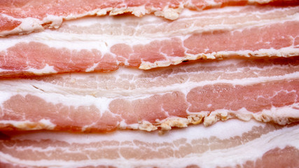 Slices of bacon, salt-cured pork