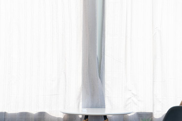 White curtain and table in the coffee shop cafe.