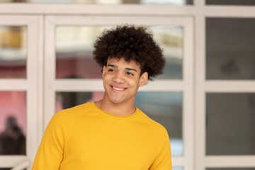 Pensive teenager with afro hairstyle