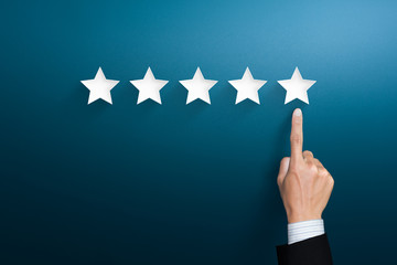 Increase rating company or ranking, evaluation and review concepts. Businessman hand pointing...