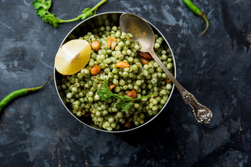 Hariyali sabudana khichdi is a delicious twist to the regular Sago khichadi made using cilantro , chillies and groundnuts