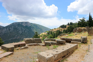 Fototapeta na wymiar Scenic view to ruins of ancient greek city Delphi with mountains and valley on the background