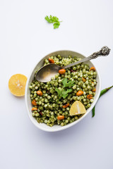 Hariyali sabudana khichdi is a delicious twist to the regular Sago khichadi made using cilantro , chillies and groundnuts