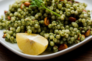 Hariyali sabudana khichdi is a delicious twist to the regular Sago khichadi made using cilantro , chillies and groundnuts