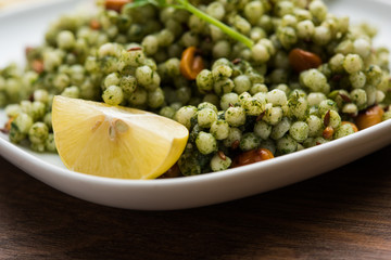 Hariyali sabudana khichdi is a delicious twist to the regular Sago khichadi made using cilantro , chillies and groundnuts