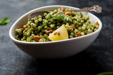 Hariyali sabudana khichdi is a delicious twist to the regular Sago khichadi made using cilantro , chillies and groundnuts