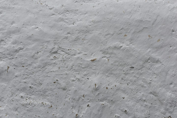 Neutral tone - plastered white wooden wall. Texture background image