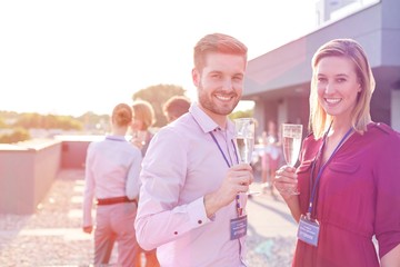 Business people on a rooftop party.