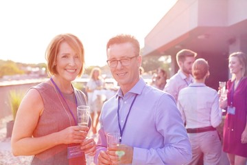 Business people on a rooftop party.