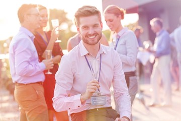 Business people on a rooftop party.
