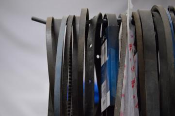 Old car belts from the engine. Rubber belts with car gas distribution mechanism
