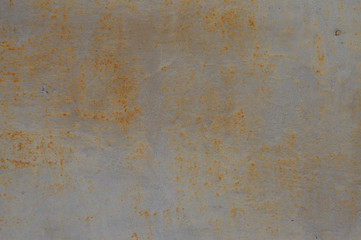 Fototapeta premium Texture of old rusty garage door with peeling paint and scratches