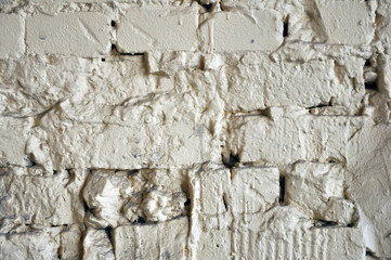 Abstract weathered texture stained old stucco light gray and aged paint white brick wall background in rural room