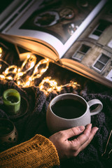Obraz na płótnie Canvas Cozy time at home with cup of coffee on a Autumn season