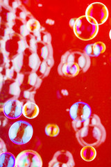 Abstract soap bubble background. Element for designers. Foam red bubble texture. Colorful bubbles float in the air