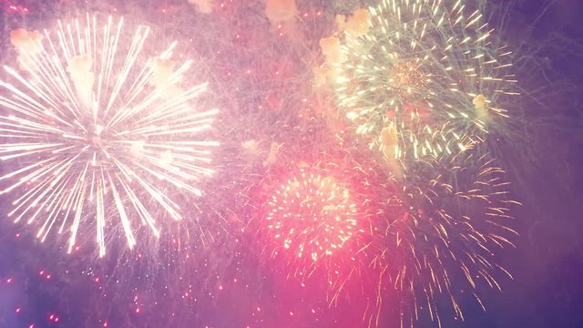 Splashes of colourful fireworks in the middle of the sky