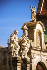 Obraz premium Saints Peter and Paul Church facade in Krakow. Statues of the Apostles.