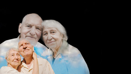 The elderly couple on black background