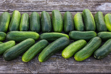 Fresh cucumbers on a wooden table